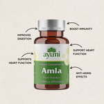Bottle of Ayumi Amla capsules highlighting benefits like improved digestion, boosted immunity, heart support, and anti-aging effects.