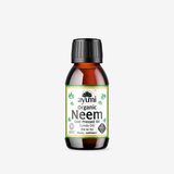 A bottle of organic neem oil with a label that includes the brand name 'ayumi' and the product name 'Neem Oil'. The bottle is amber and has a black cap.