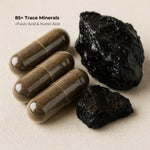 Close-up of Shilajit resin and capsules with label showing 85+ trace minerals including fulvic and humic acid