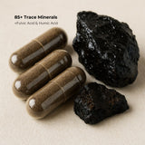 Close-up of Shilajit resin and capsules with label showing 85+ trace minerals including fulvic and humic acid