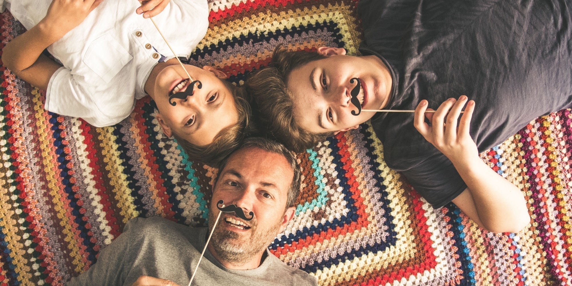 Farther &  two sons showing support Movember