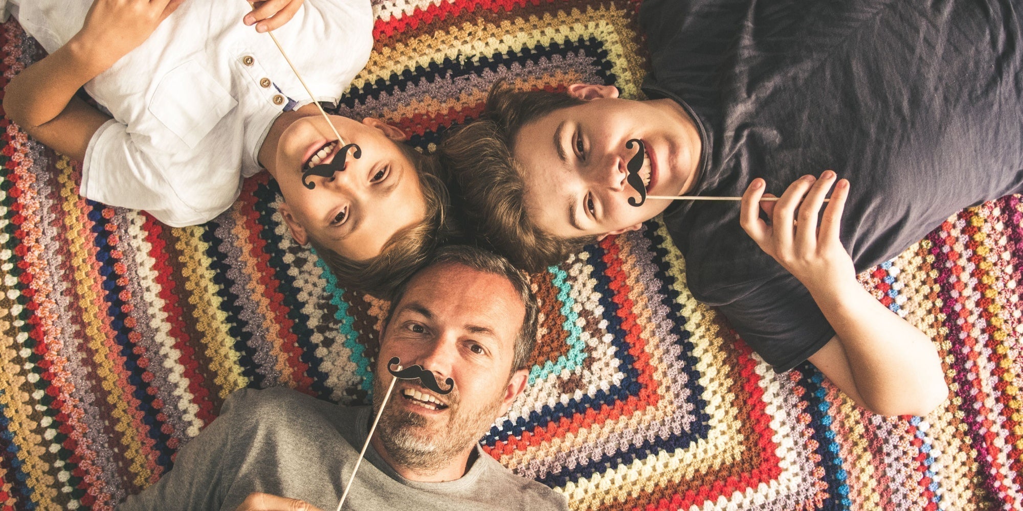 Farther &  two sons showing support Movember