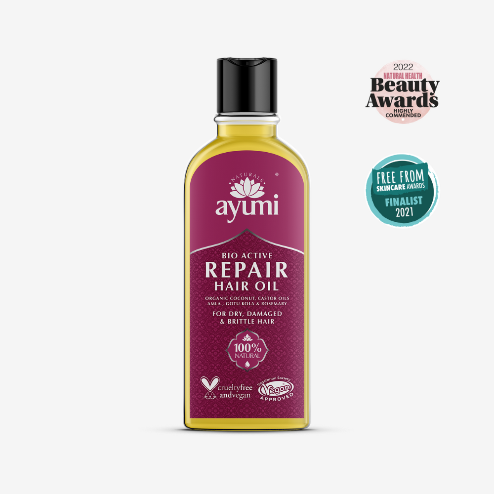 Ayumi Bio Active Repair Hair Oil bottle with awards on a white background