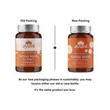 Comparison of old and new Ayumi Amba Haldi Turmeric Powder packaging on a white background.