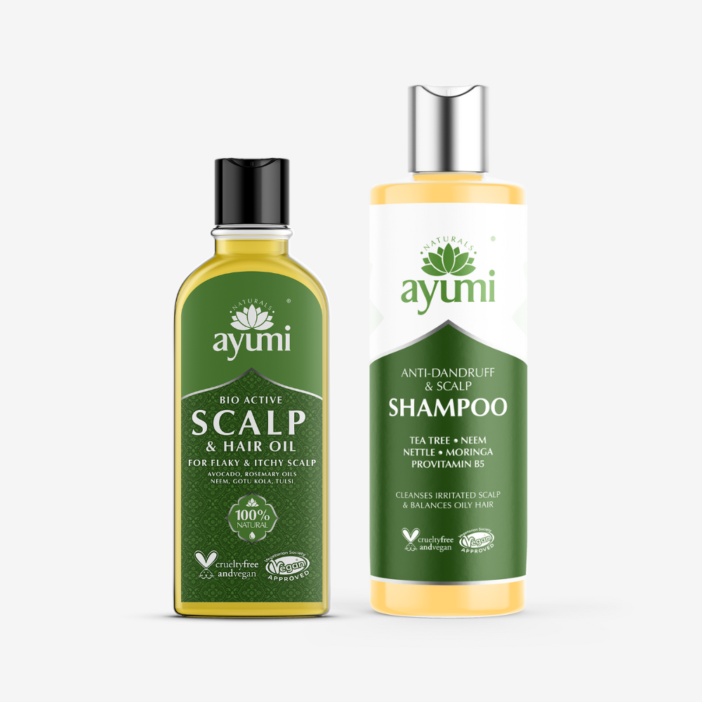 Two Ayumi hair care products, scalp oil and shampoo, on a white background.