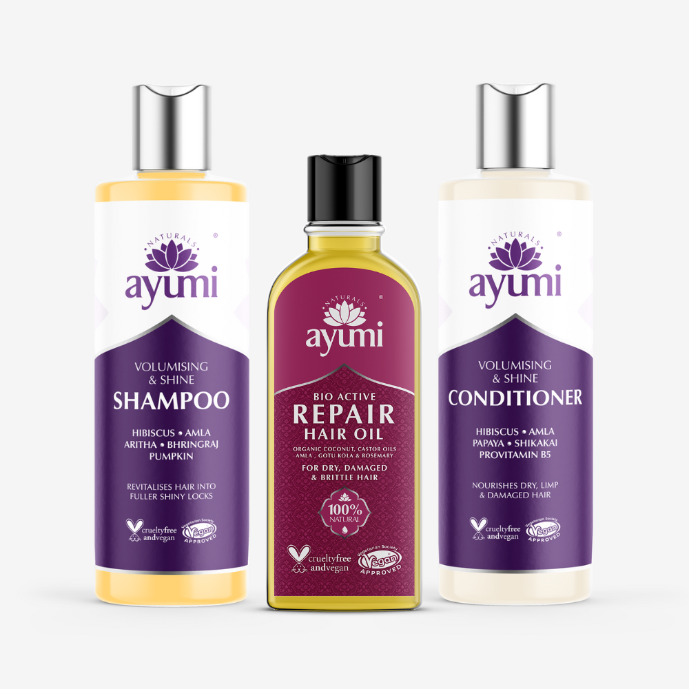 Three Ayumi hair care products on a white background