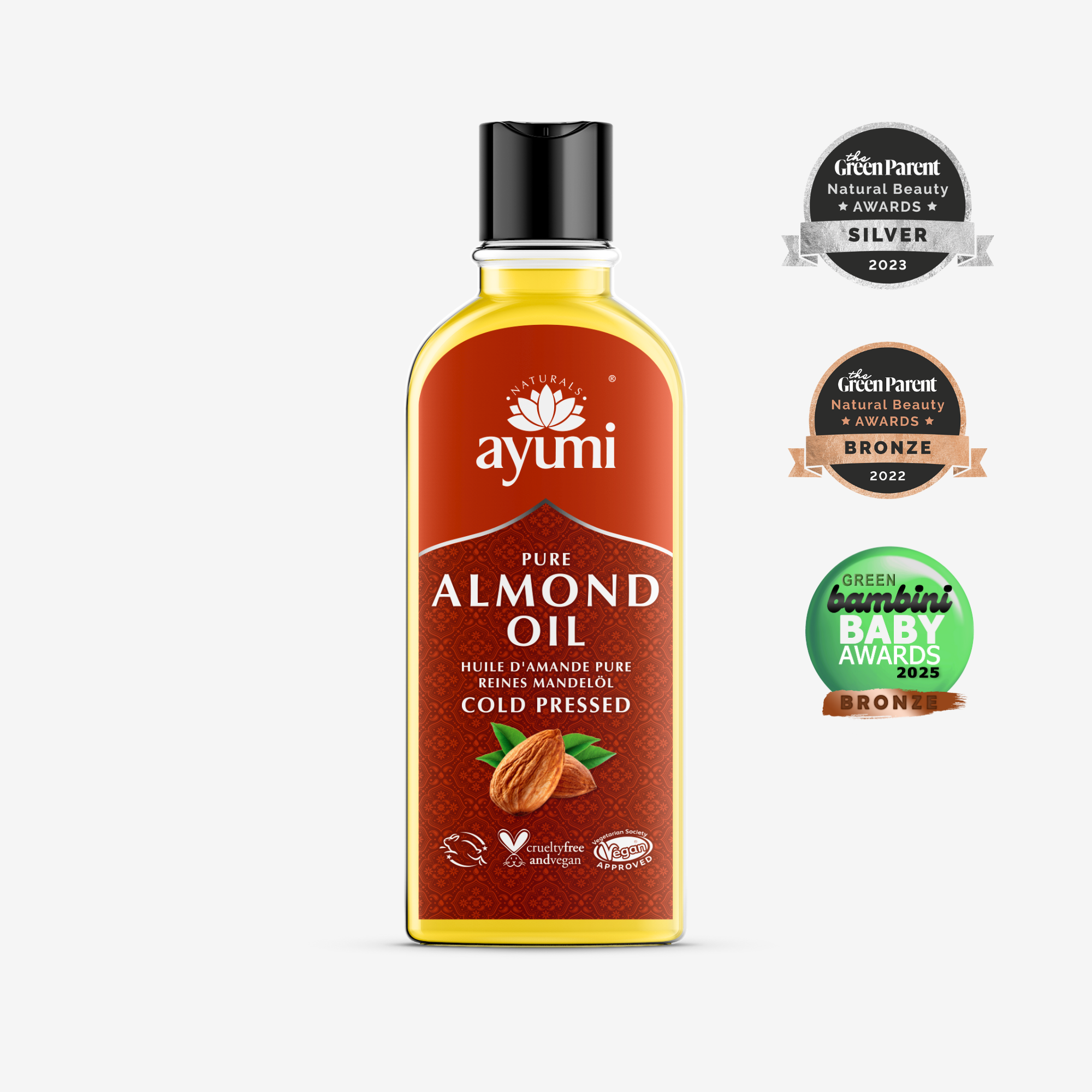 Ayumi almond oil bottle with awards on a white background