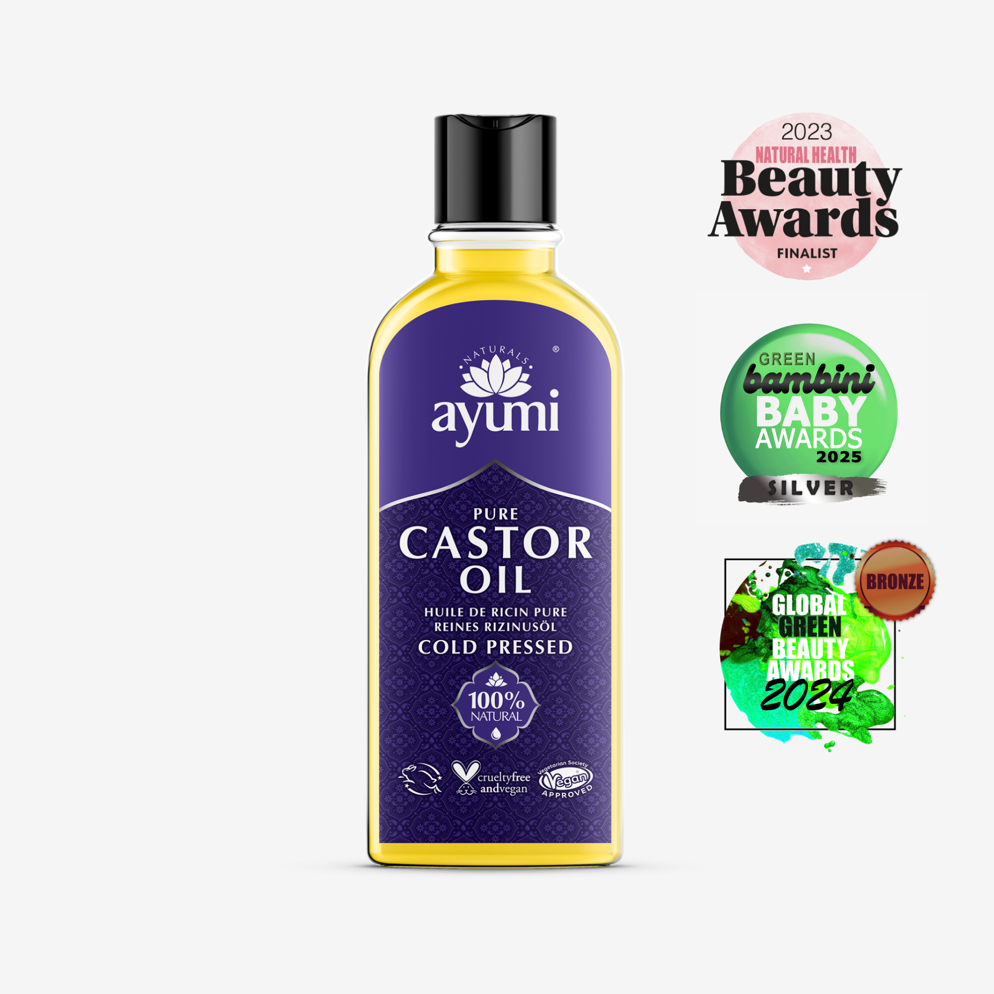 Ayumi castor oil bottle with awards on a white background