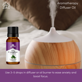 Ayumi Camphor Oil in amber bottle used in diffuser – promotes relaxation, clears sinuses, and refreshes air