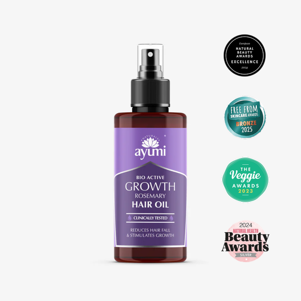 Ayumi Growth Rosemary Hair Oil bottle with awards on a white background