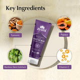 Ayumii face scrub with key ingredients displayed around it on a beige background