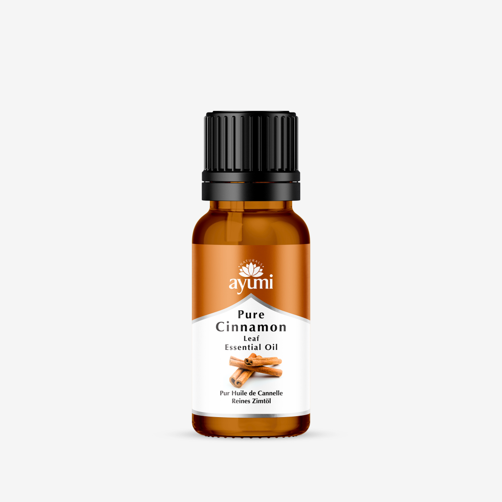 Bottle of Ayumi Cinnamon Oil on white background