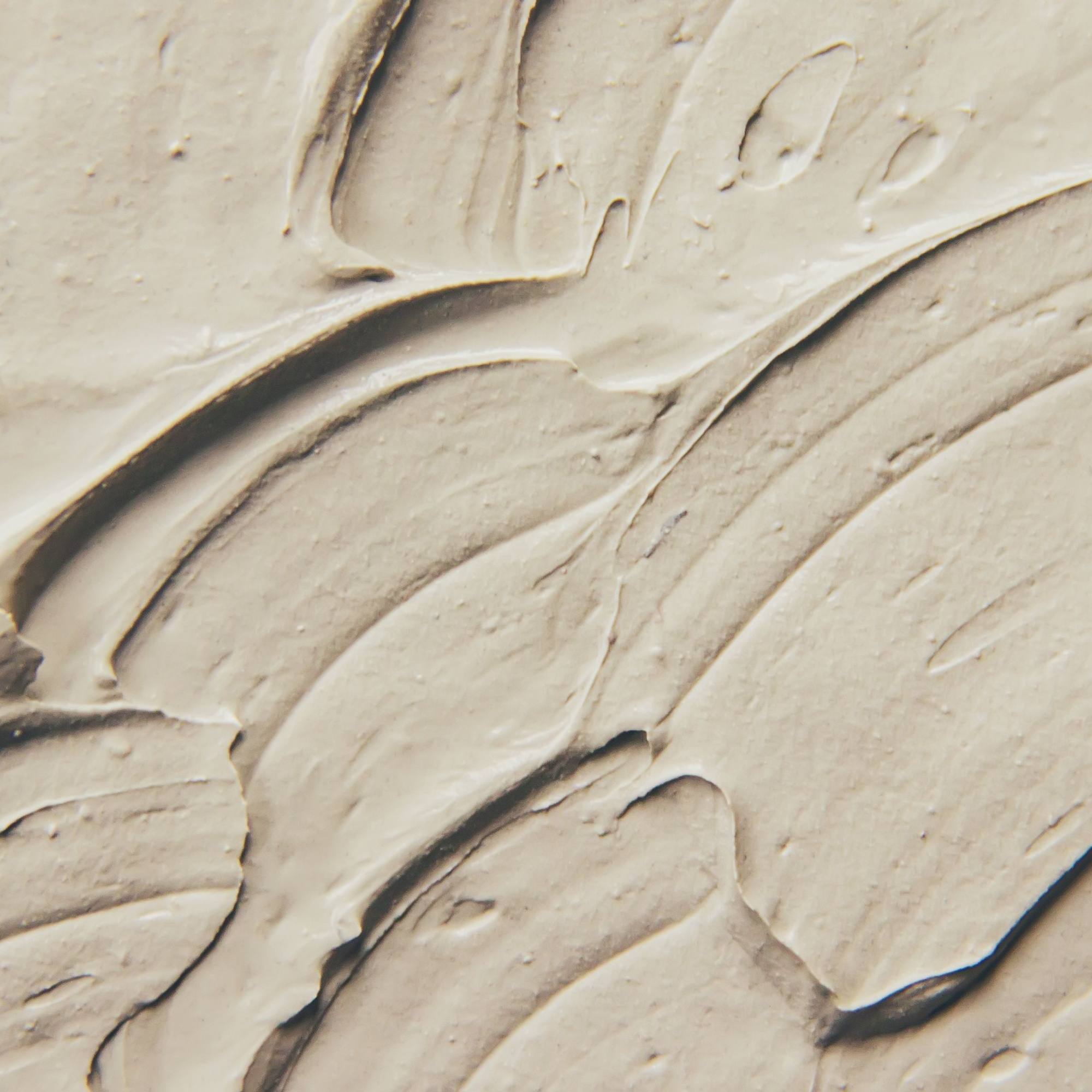 Close-up of a Ayumi Multani Mati face clay mixed with visible texture and swirls 