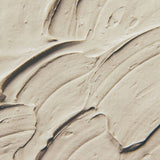 Close-up of a face clay mixed with visible texture and swirls