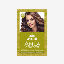 Packaging of Pure Amla Powder hair conditioner by ayumi, featuring an image of a woman with long, wavy hair and the product name across a green patterned background.