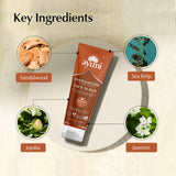 Ayumi Sandalwood Face Scrub with key ingredients displayed on a beige background