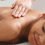 A woman have a body Scrub with Ayumi Sandalwood Body Scrub