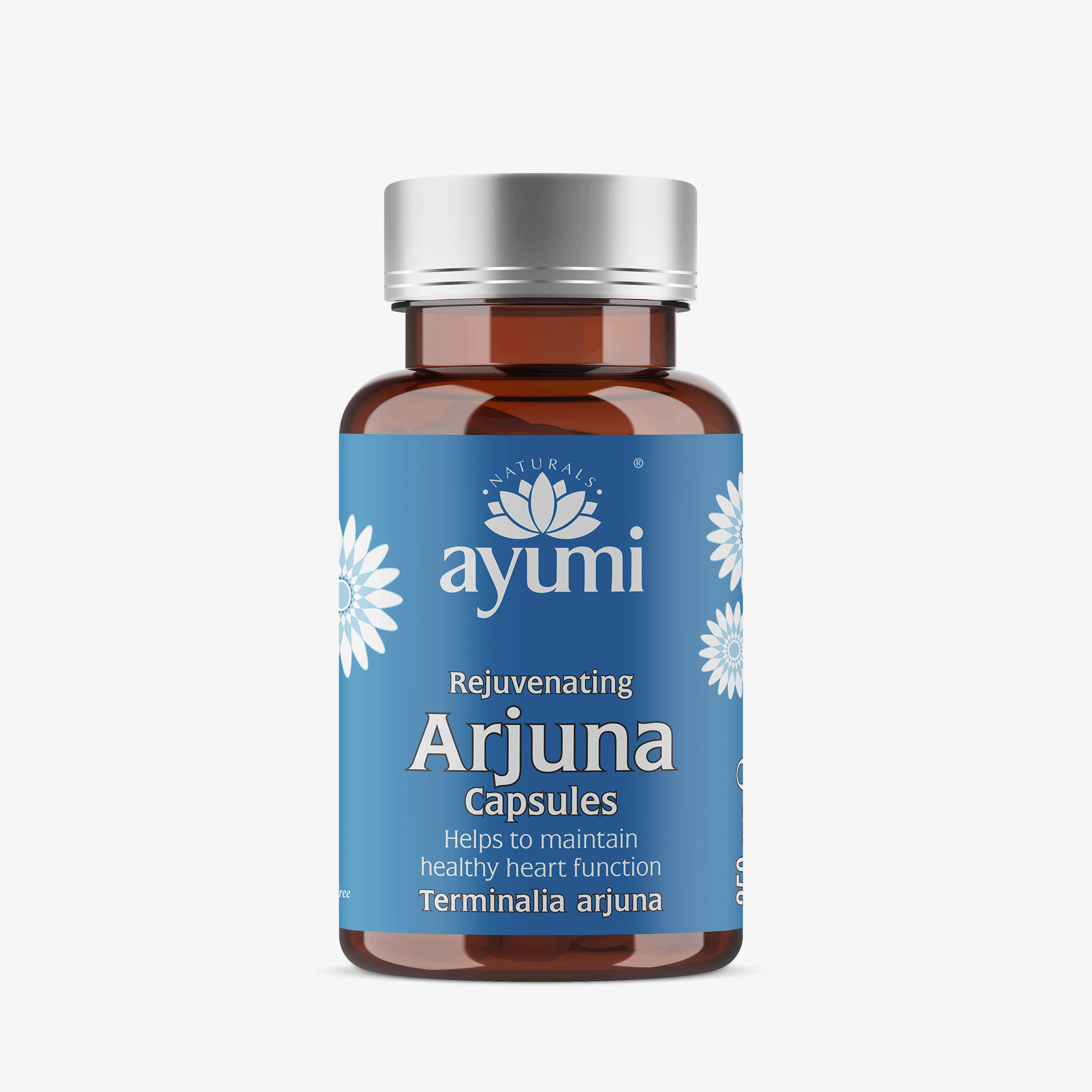 A bottle of Ayumi Rejuvenating Arjuna Capsules on a light gray background. The product features an amber brown glass bottle with a metallic silver cap and a blue label with white text and floral designs.